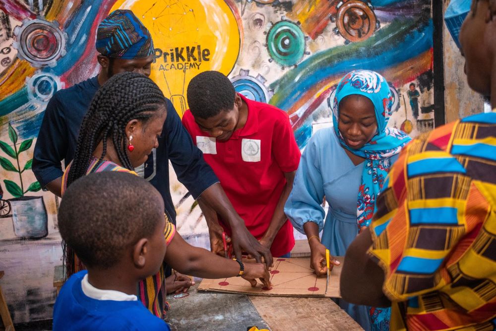 Children, young people, and educators making a project together
